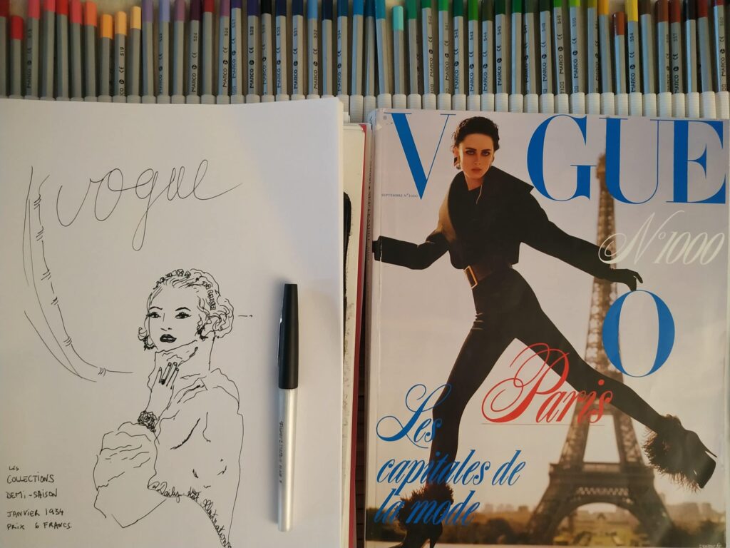 Magazine vogue ouvert sur une illustration de mode