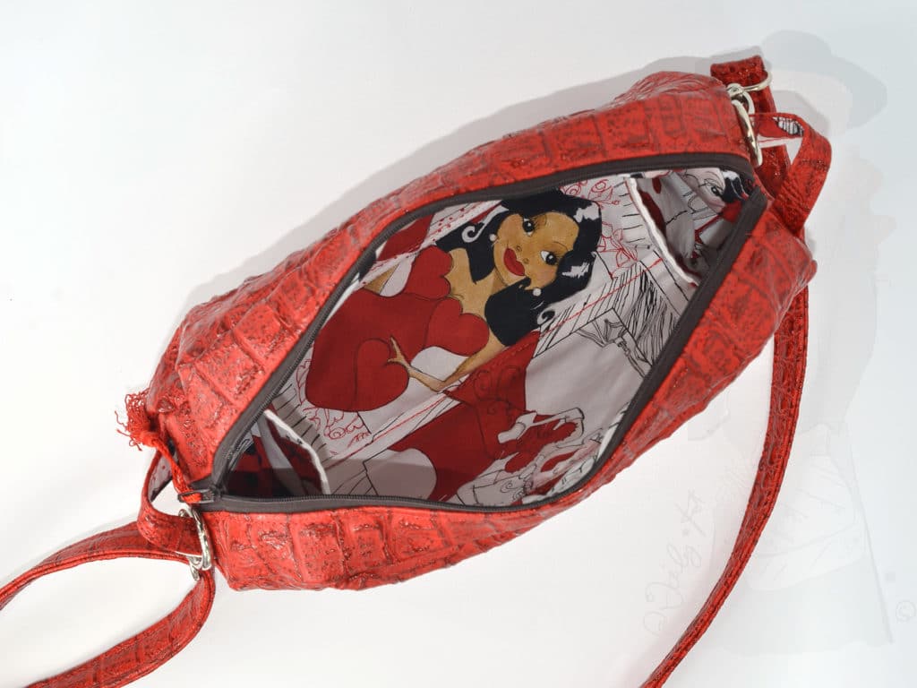 Intérieur du sac à porter en bandoulière, vue du dessus
