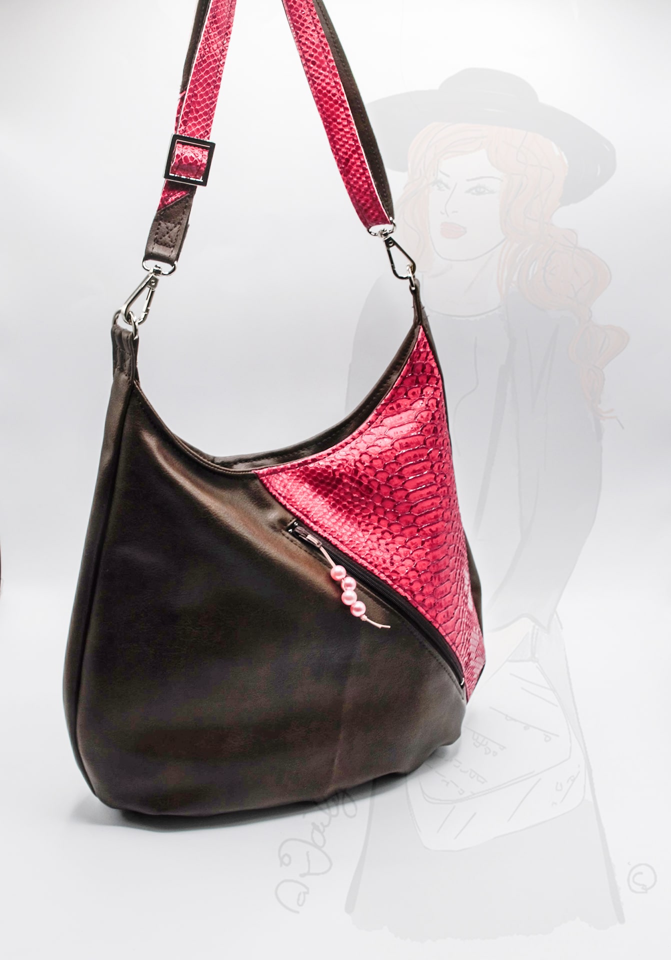 Sac bandoulière rose et ébène, vu du cpoté de la poche extérieure, zippée